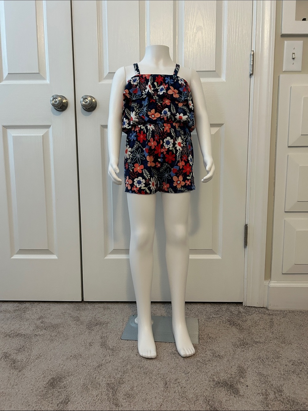 Girl’s Navy Floral Ruffle Romper Size 7